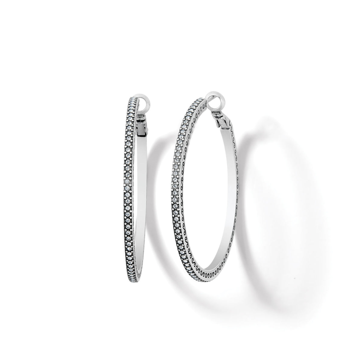 Silver plated large hoop earrings with fine crystal pave details on a post back.