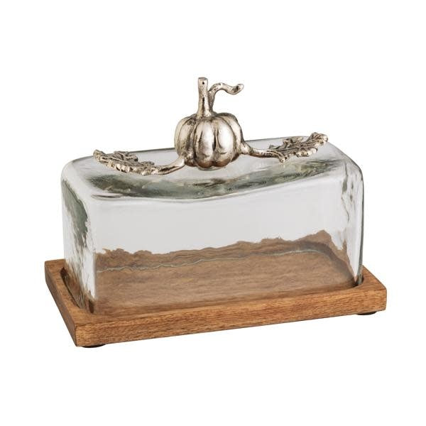 Metal pumpkin butter dish with mango wood base and glass lid featuring a cast aluminum handle.