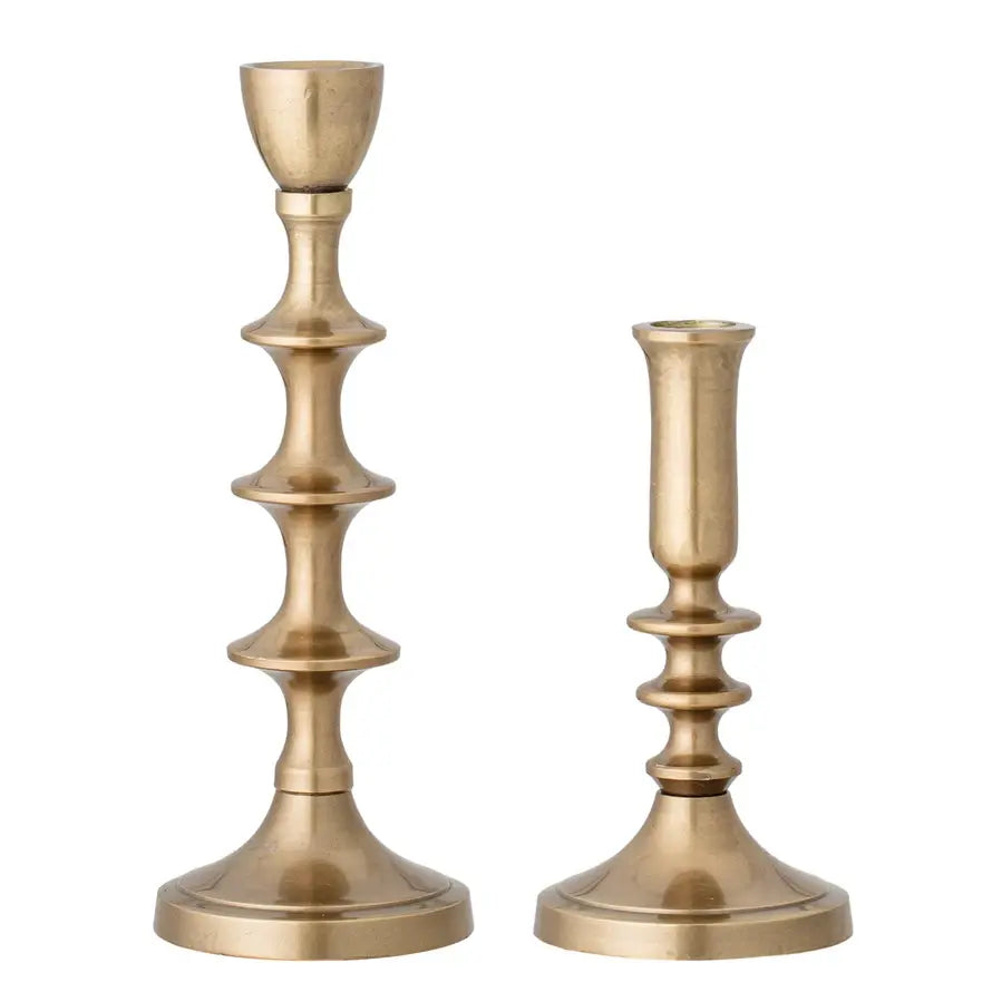 Antique gold aluminum metal taper candle holder with a worn vintage patina finish.
