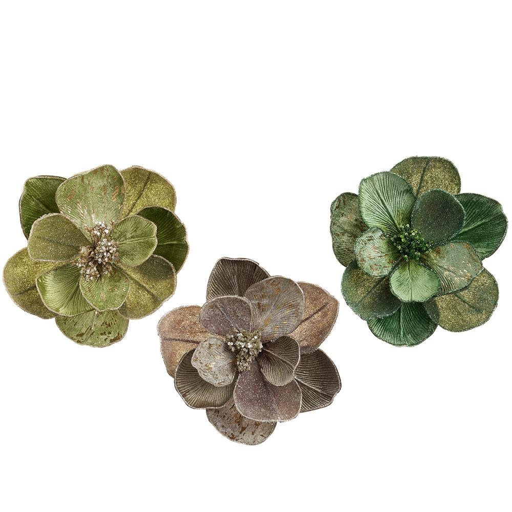 Metallic pearlized magnolia flower clip in white polyester with glitter accents.