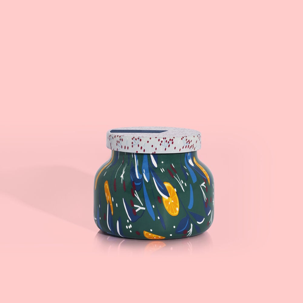 8 oz Volcano Holiday Pattern Play Petite Jar candle with festive holiday patterned wax and a black wick.