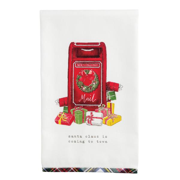 Flour sack towel with Santa sleigh print and tartan appliqué trim in red and green cotton.