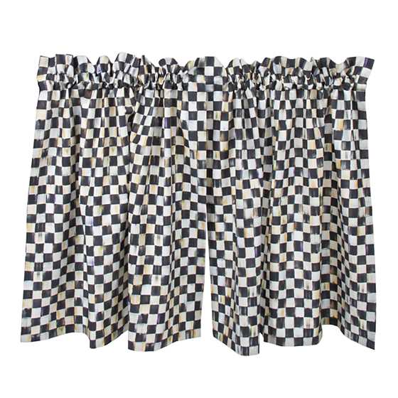 Two cotton cafe curtain panels with a black and white hand-painted checkered pattern.
