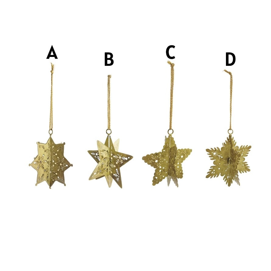 Four metal 3D snowflake ornaments with cut-outs in an antique gold finish, labeled A through D.