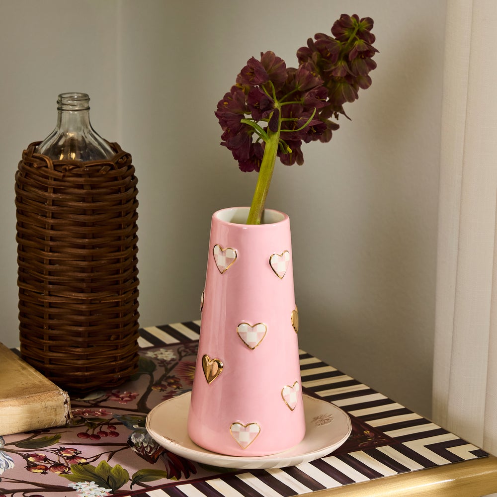 Rosy Check Tall Heart Vase in pink ceramic with gold-rimmed checkered heart accents and a flower.