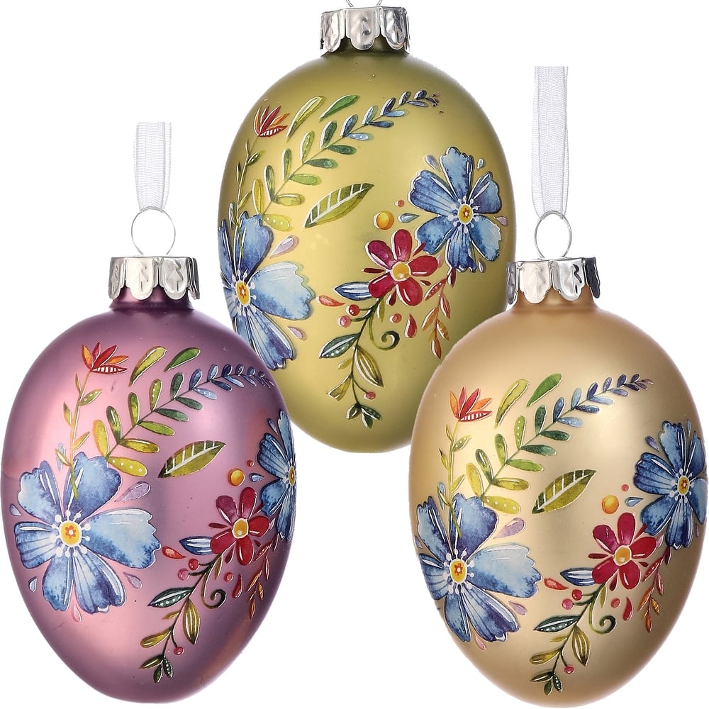 Glass spring blossom egg ornament with a delicate floral petal design in soft pastel tones.