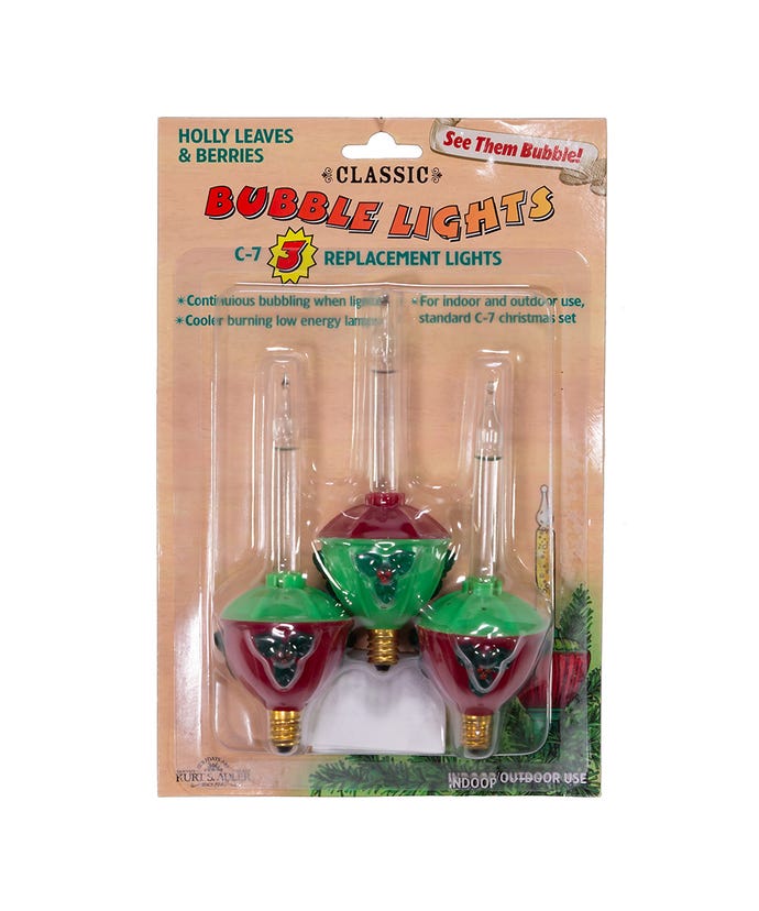 Pack of three C7 bubble light replacement bulbs with red and green bases in original packaging.