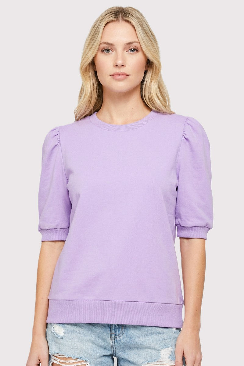 Eloise solid sweatshirt with puff half sleeves in a crew neck silhouette.
