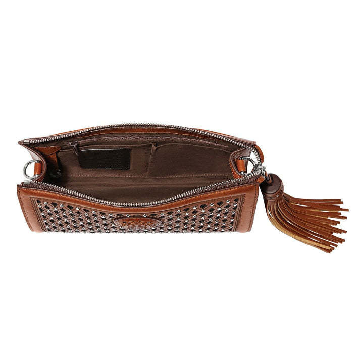 Russet Michela cross body bag with diamond eyelet shell, leather trim, and adjustable strap.