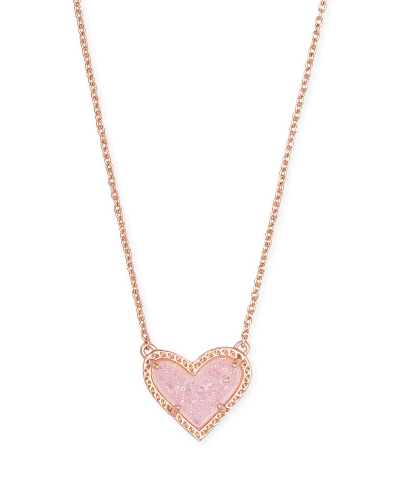 Silver-tone Ari Heart short pendant necklace with asymmetrical heart shape on a chain.