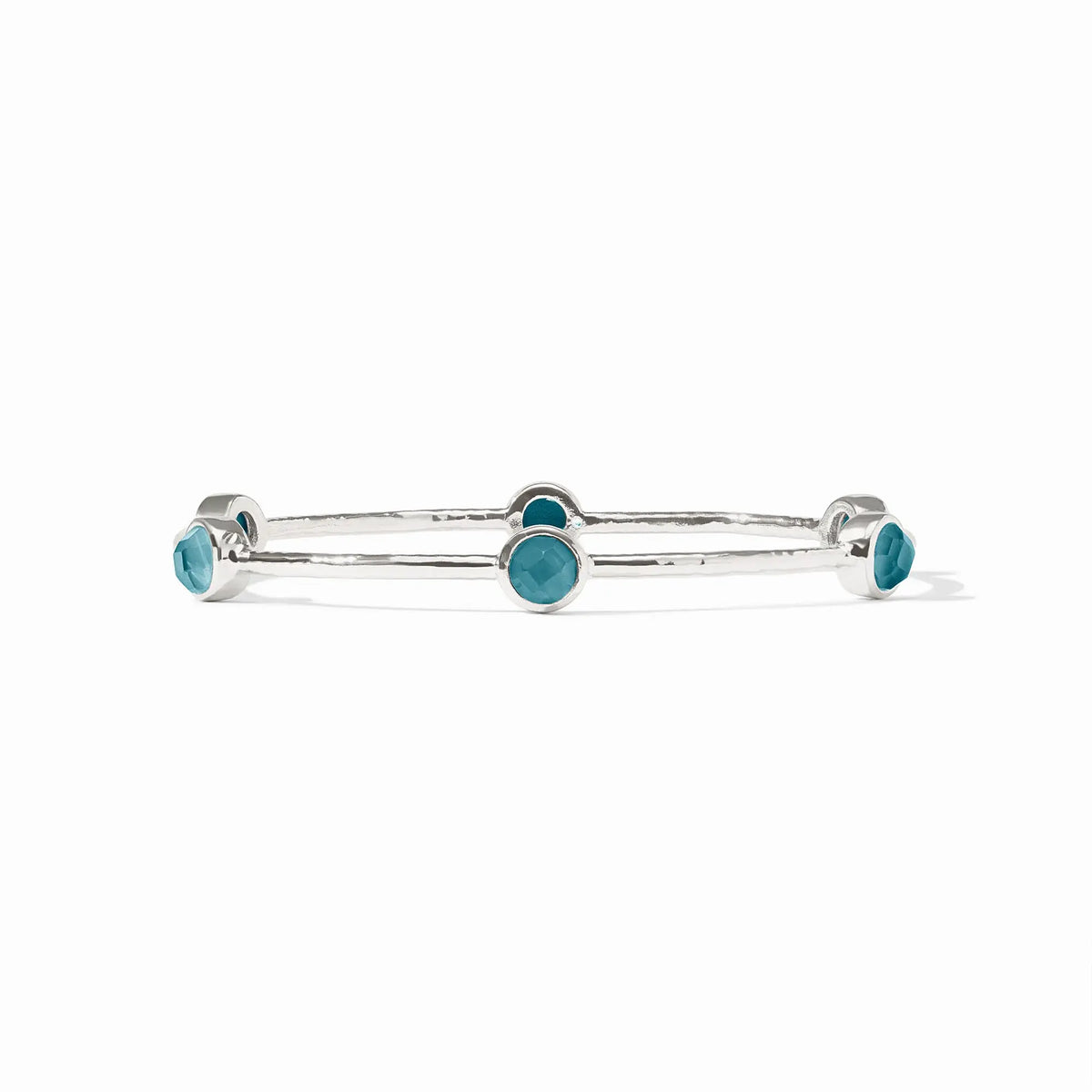 Silver hammered bangle with six iridescent Montana blue gemstone stations