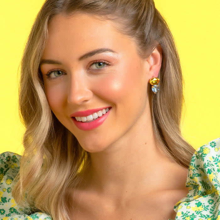 Mini Ally gold-plated stud earrings with a small circular shape.