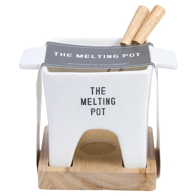 Ceramic mini fondue pot with wooden handles and two skewers
