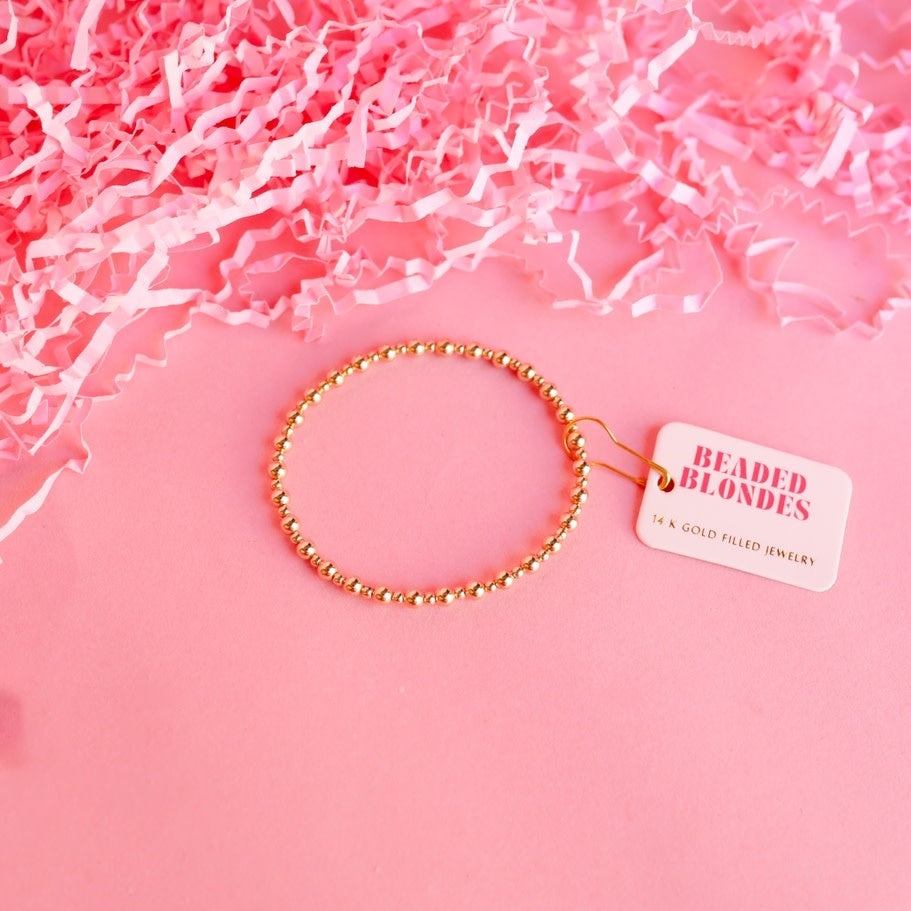 Mini Katy bracelet in gold with elastic string