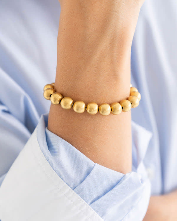Triple-plated gold Mini Margaret bracelet with a delicate chain link design.