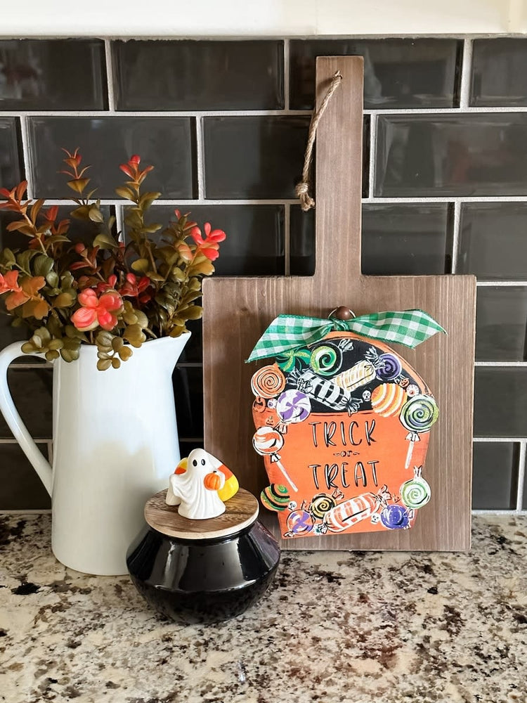 Mini Trick or Treat Bag Charm: a small hanging Halloween decoration with festive colors.