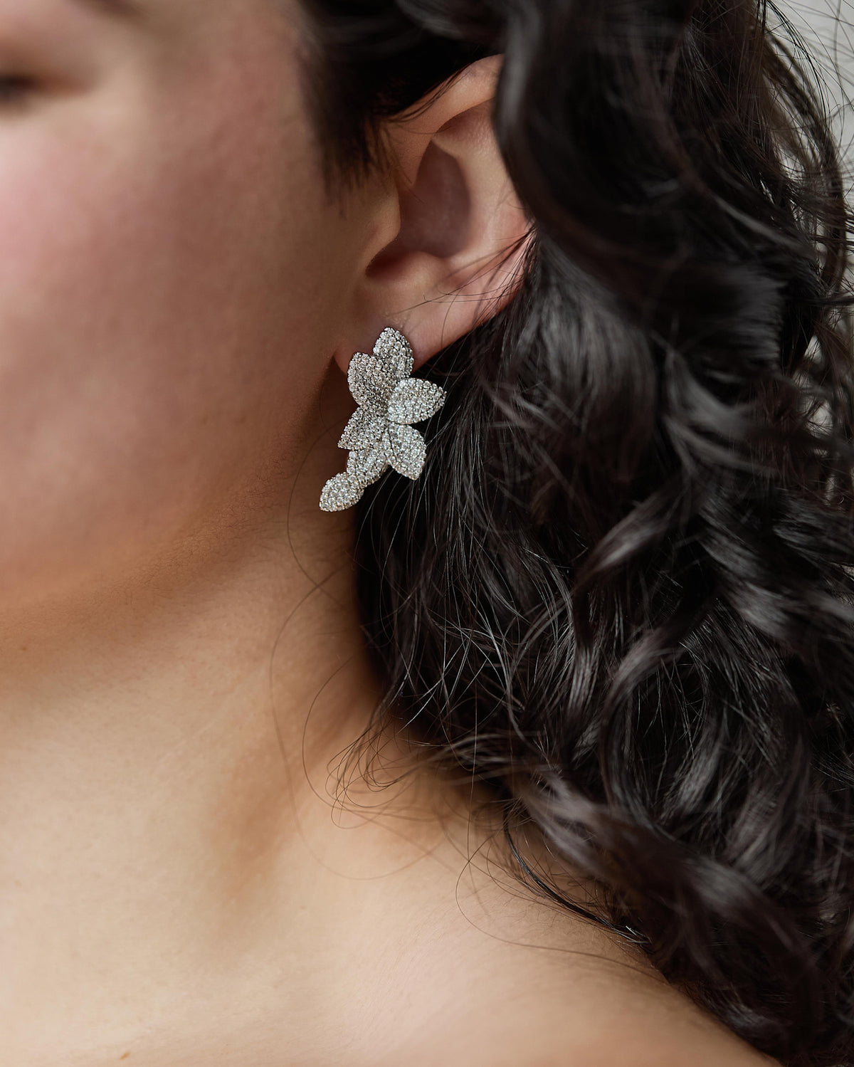Mira medium Plumeria statement earrings with micro pavé high-quality CZ in silver-tone metal.