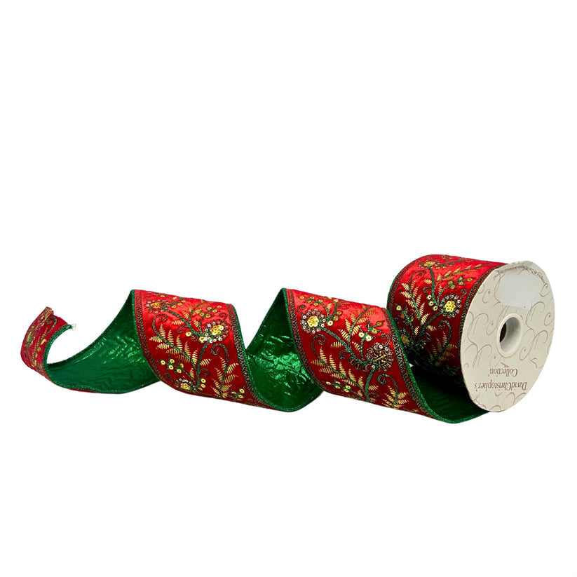 Red velvet ribbon featuring green fern embroidery with gold sequin accents.