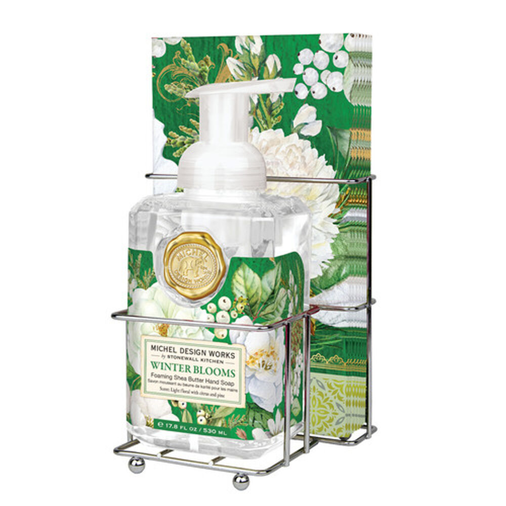 Foaming hand soap dispenser with matching napkin holder set in white finish.