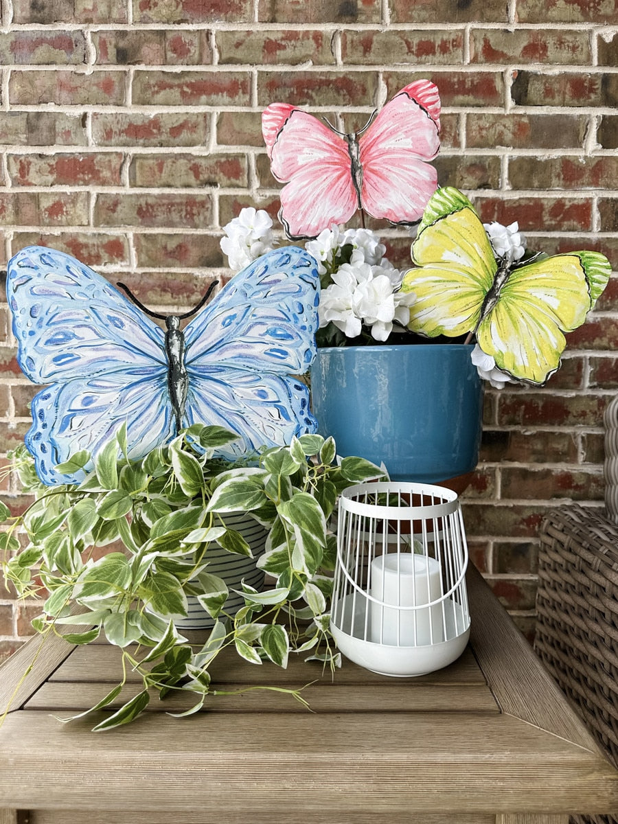 Beck's Blue Butterfly Large stake/hang decoration in blue with a butterfly silhouette and patterned design.