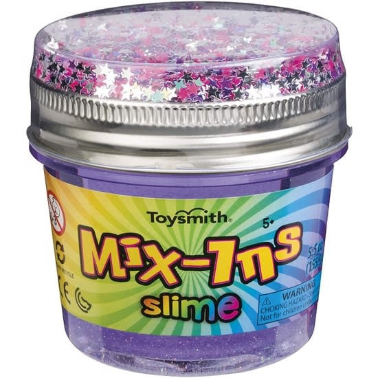 A cup of colorful slime topped with confetti mix-ins in a clear container.