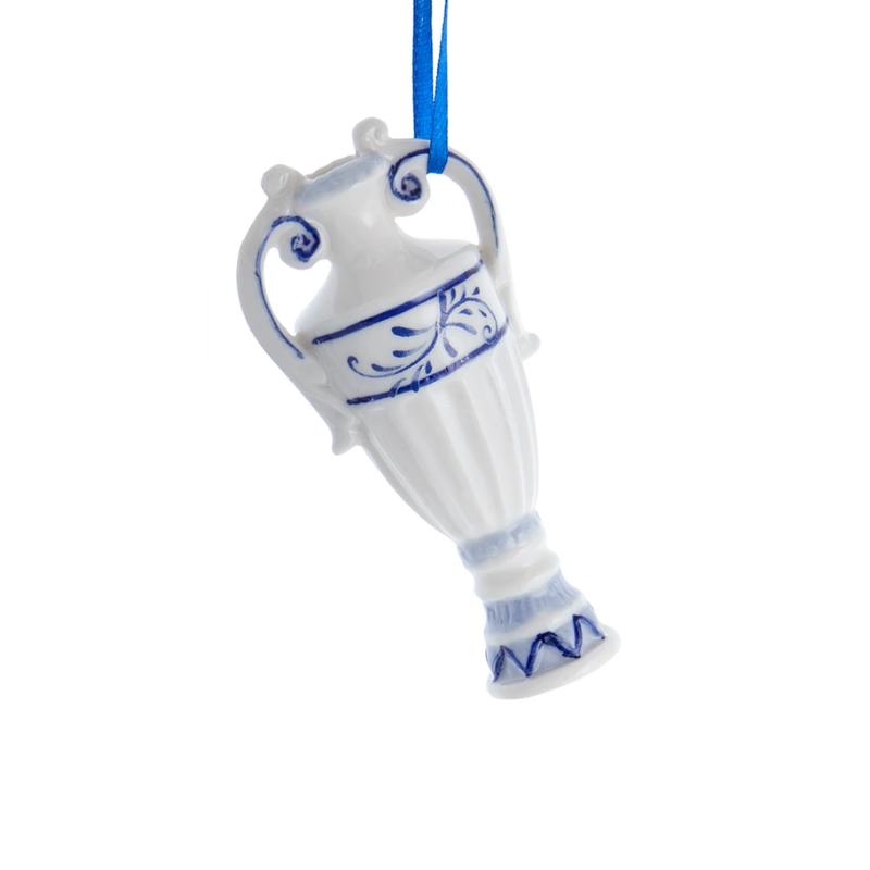White ceramic vase ornament with blue floral patterns and a blue hanging ribbon.