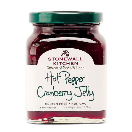 Jar of hot pepper cranberry jelly with a red label