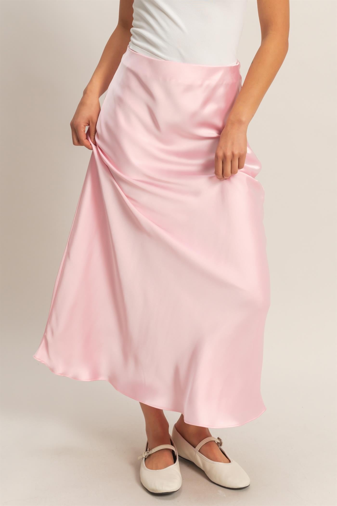 Angel Satin Maxi Skirt in black bias-draped polyester with a flowing silhouette.