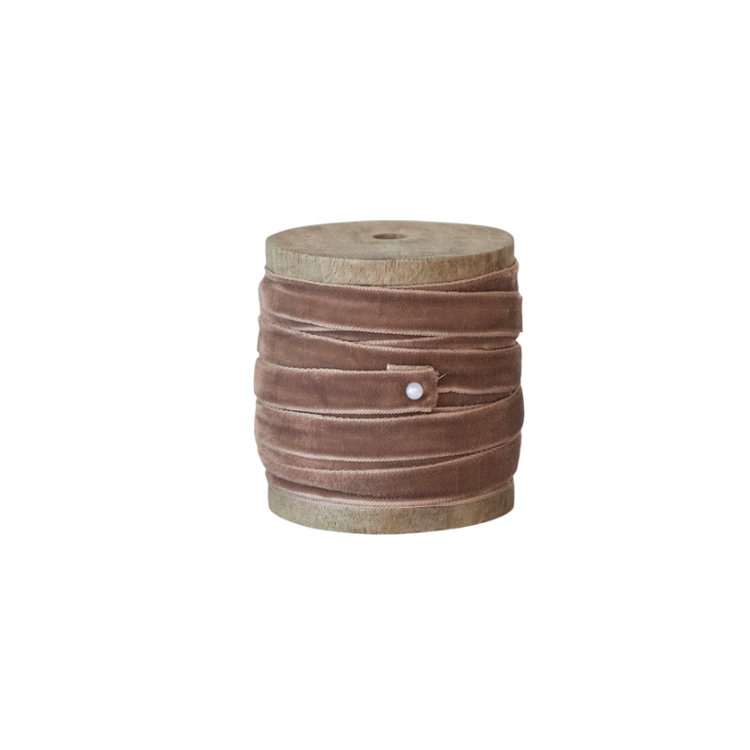 10-yard mauve velvet ribbon wrapped around a rustic mango wood spool.