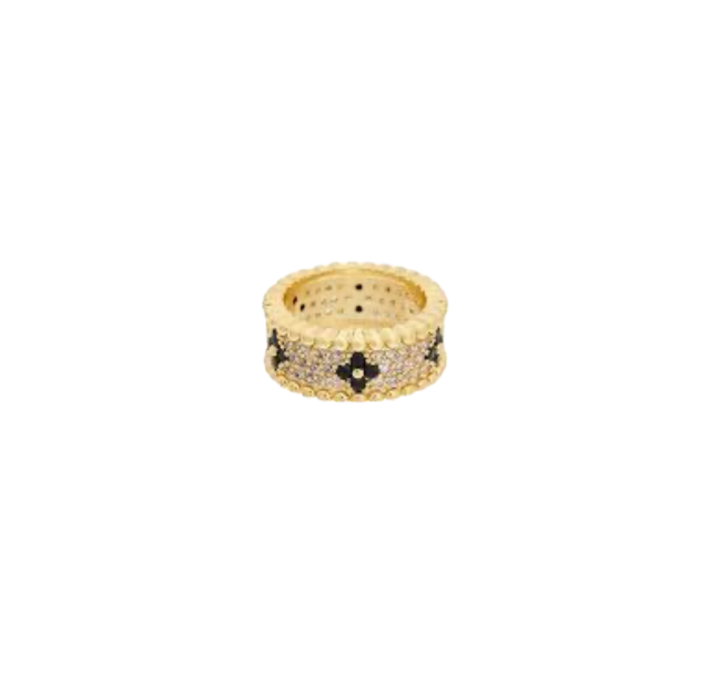 Gold-tone fashion statement ring with clear pavé stones and black floral motifs.