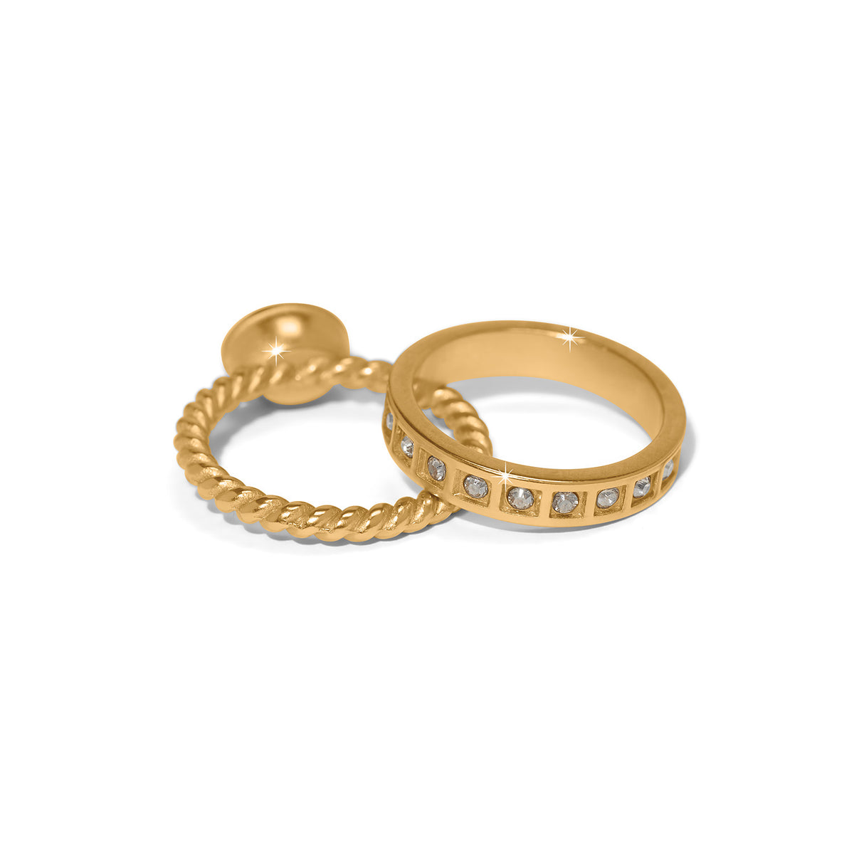 Love Knows Duo Rings featuring one gold-plated twisted band and one gold band with inset crystals.