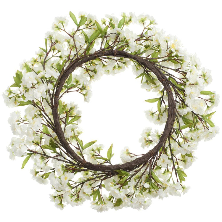 Round cherry blossom wreath with pink floral patterns on a metal wire frame.