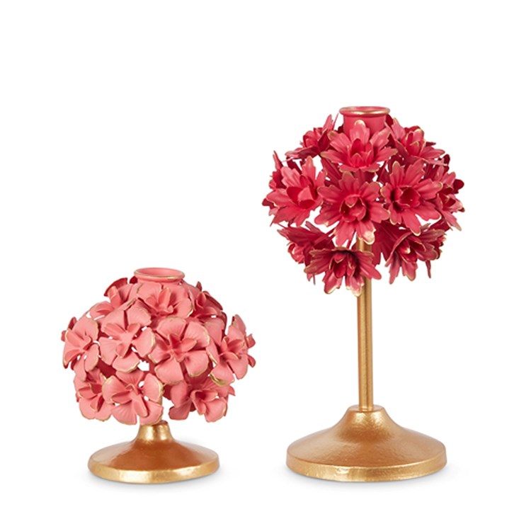 Pink floral iron candle holders with a delicate flower pattern.