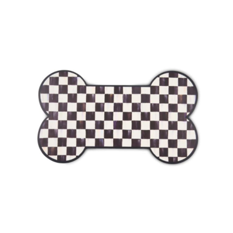 Bone-shaped placemat with a black and white checkered pattern and a thin black border.
