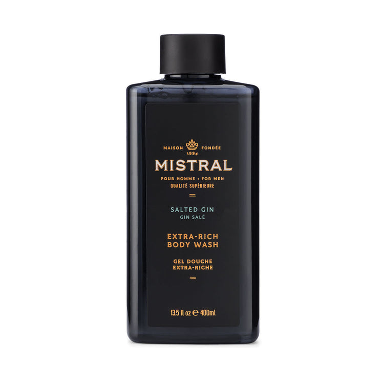 Bottle of Salted Gin Body Wash with a white label featuring grapefruit botanicals and saltwater design elements.
