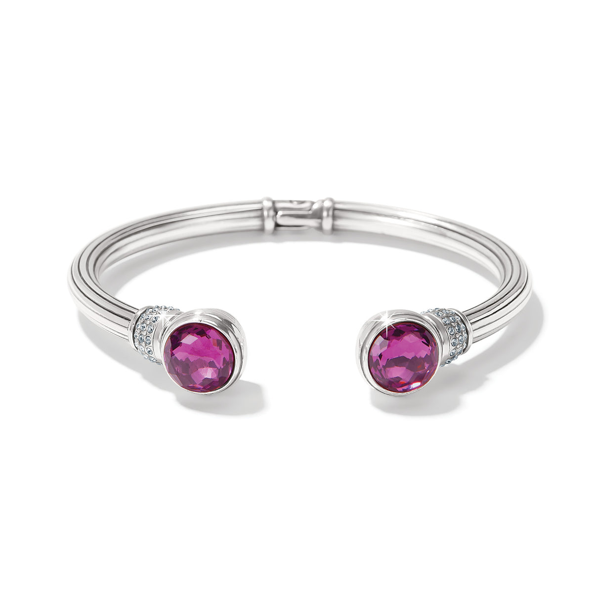Silver hinged bangle with European crystals in a golden shadow hue capped with pave stones.