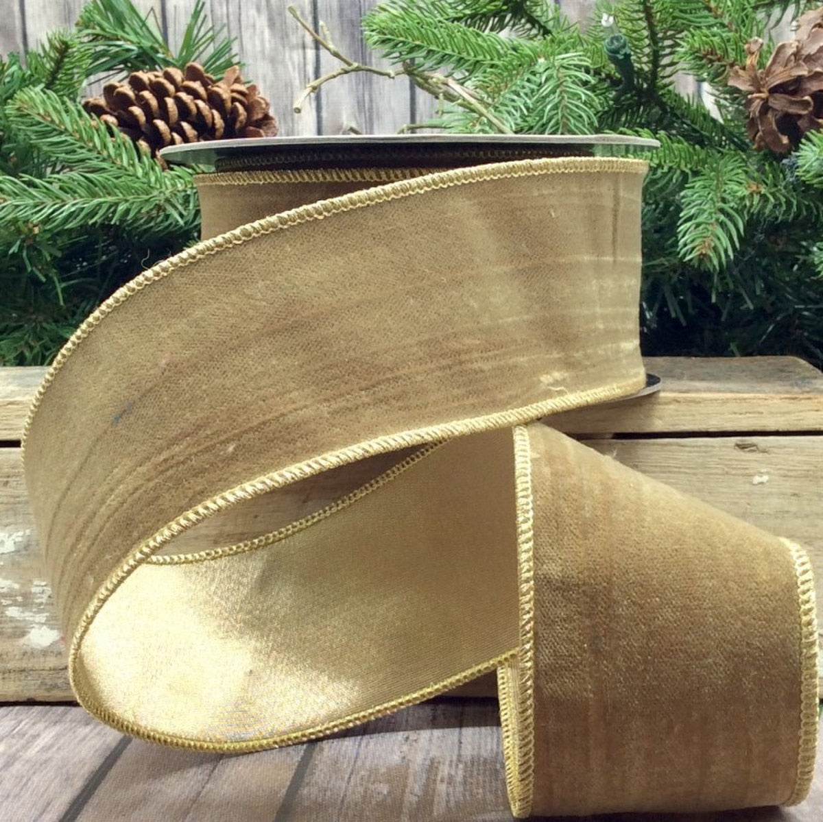 A spool of chestnut velvet ribbon with a gold back.
