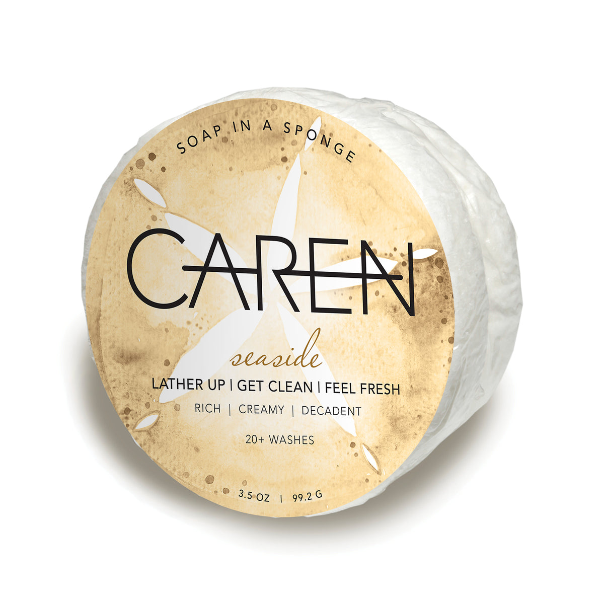 Seaside White Shower Sponge by Caren, a round soap-infused sponge with a sand dollar design.