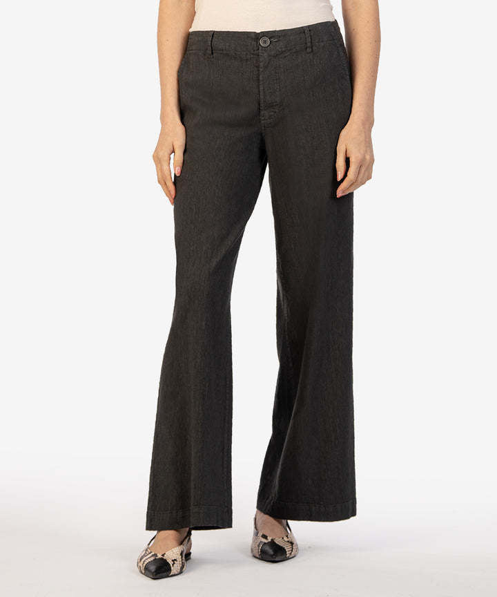 Meg Linen high rise wide leg pants in a soft neutral tone with an elastic waistband and relaxed silhouette.