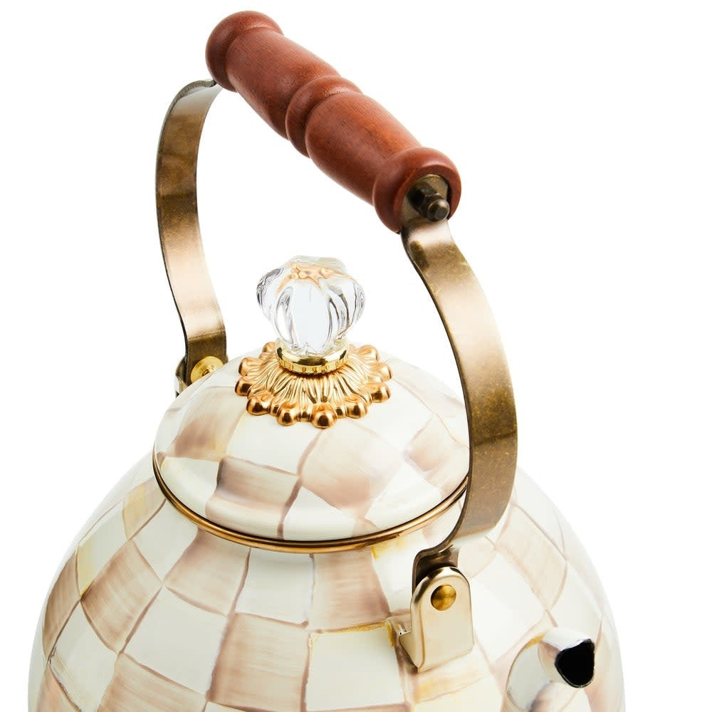 3-quart tea kettle with mocha checkered steel body, wood handle, and brass accents.