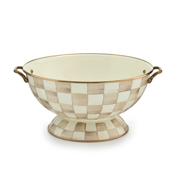Hand-glazed steel everything bowl with mocha check pattern, bronzed stainless rim, and antiqued brass handles.