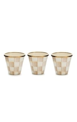 Hand-glazed steel herb pot with mocha checkered pattern and bronzed stainless steel rim.