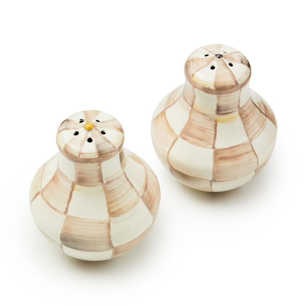 Hand-glazed steel salt and pepper shakers with mocha check pattern and silicone plugs