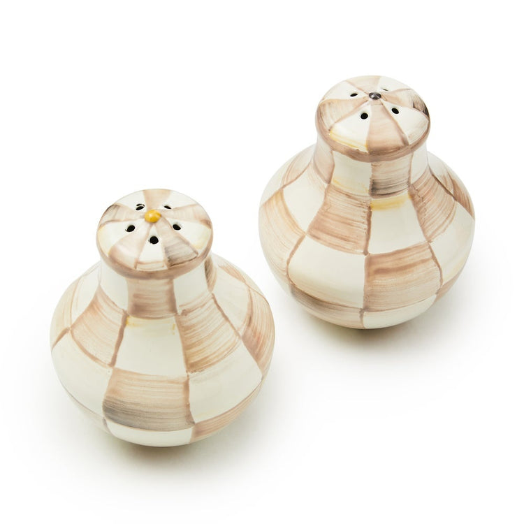 Hand-glazed steel salt and pepper shakers with mocha check pattern and silicone plugs