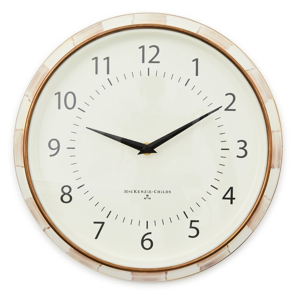 Round wall clock with printed numbers on face, hand-painted mocha check pattern side panel, and bronzed stainless steel rim.