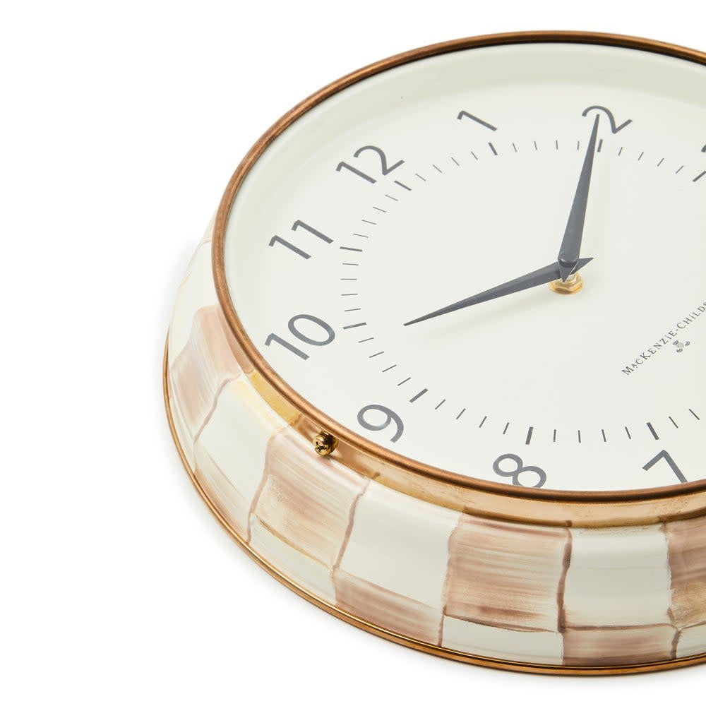 Hand-painted mocha check steel wall clock with printed numbers on the face.