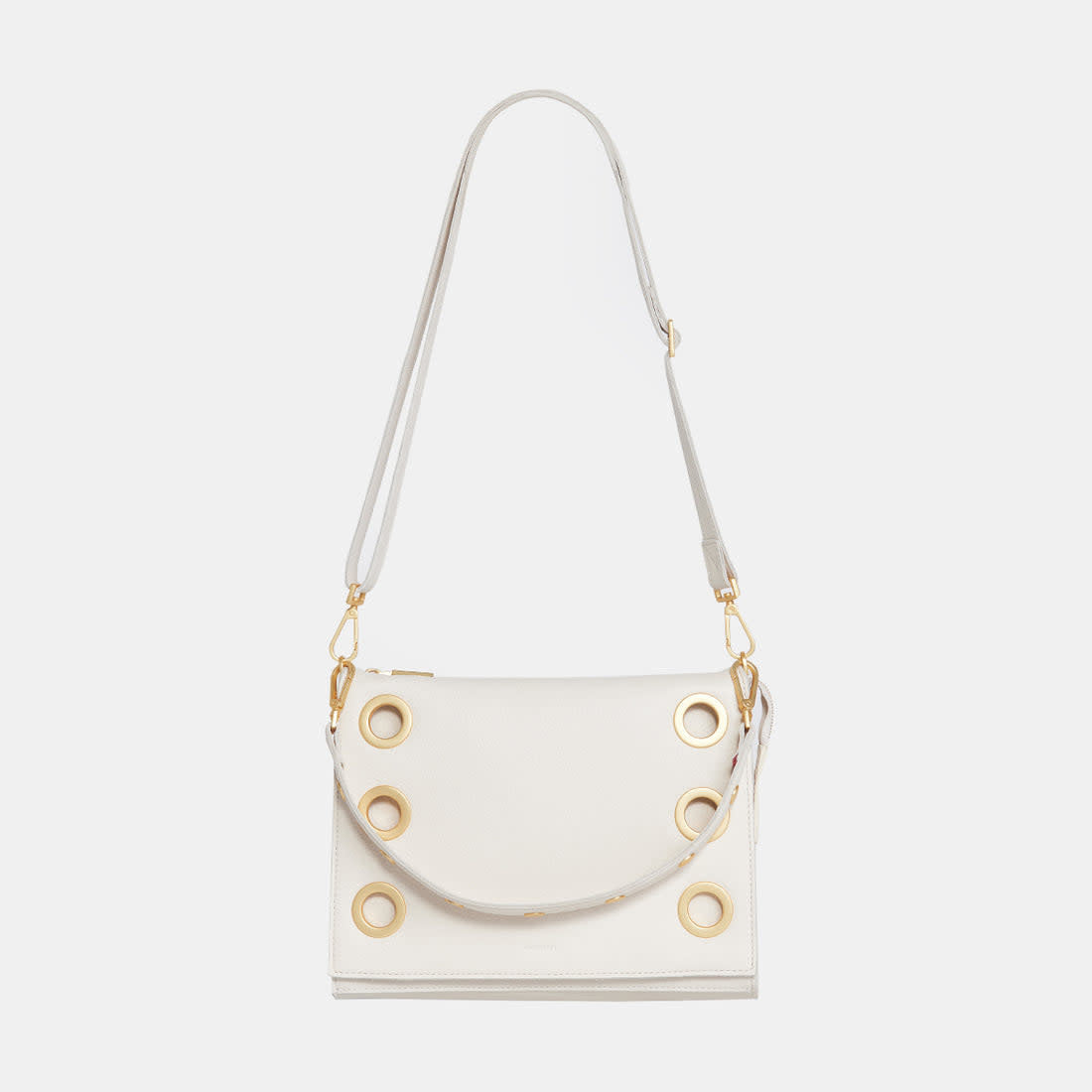 White brushed gold Montana Clutch Large with vintage Hammitt strap, riveted hardware, and magnetic closure.