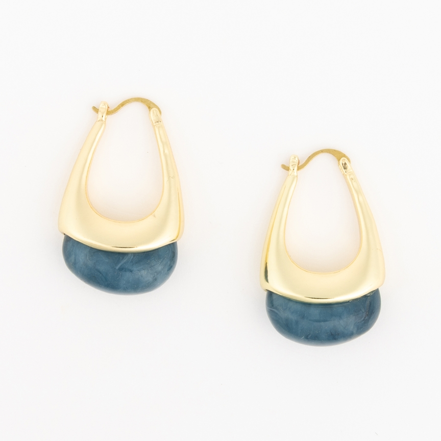 Talia gold hoop earrings with a teardrop shape and blue marbled resin accents.