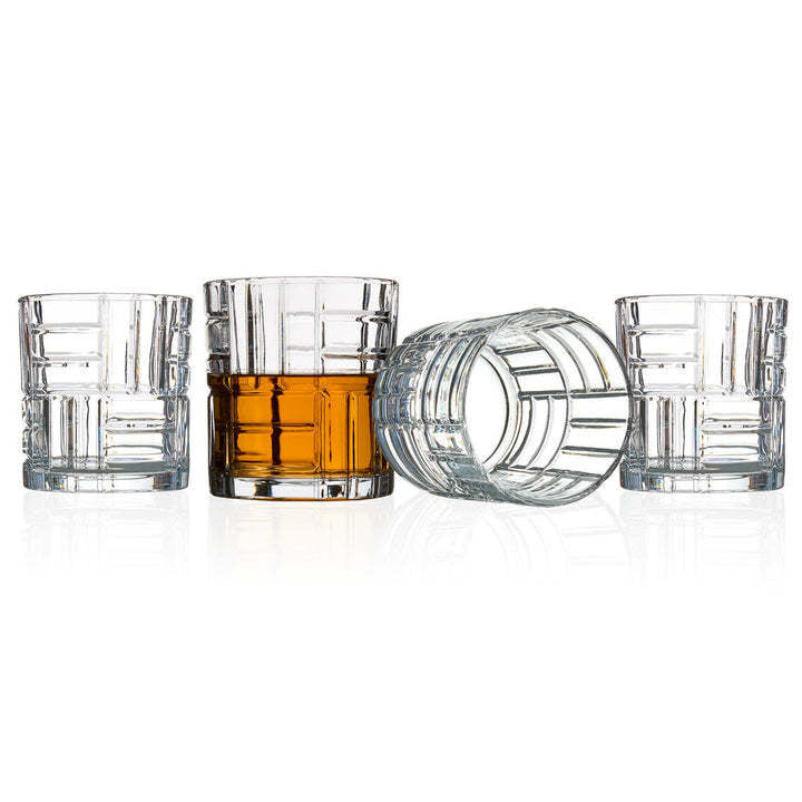 Mosaic double old-fashioned glass with bold geometric tile pattern in white and black.