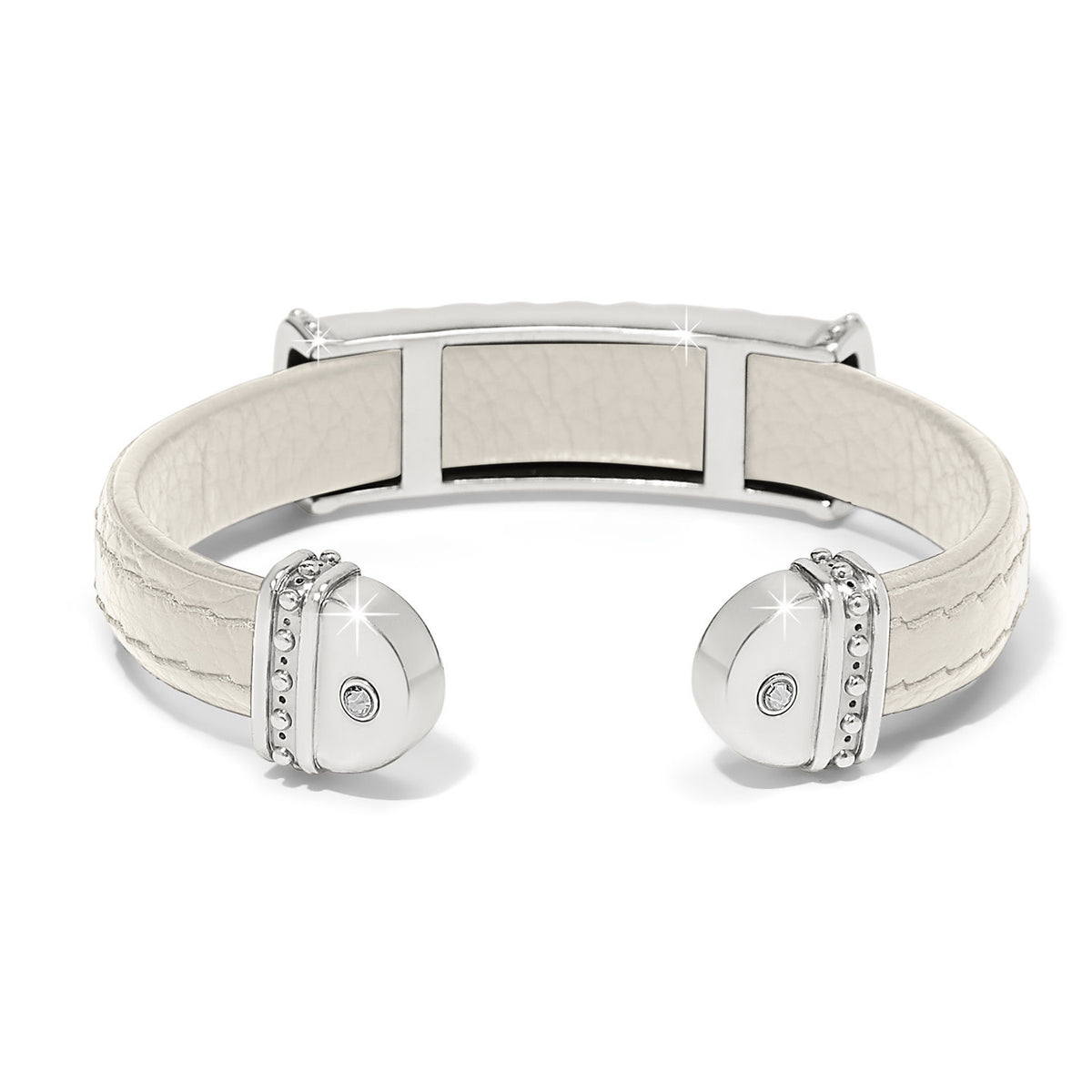 Two-tone leather bar cuff bracelet with a mosaic geometric pattern.
